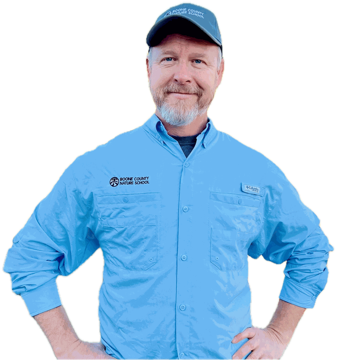Joe Brown, hands on hips, in his Boone County Nature School cap and shirt